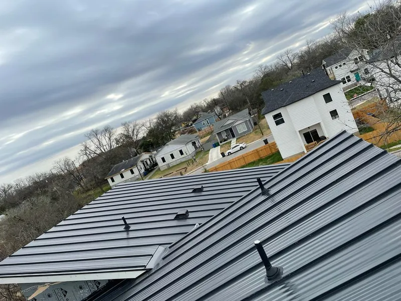 Standing seam metal roof panels with vents for Skylight Repair in Geddes